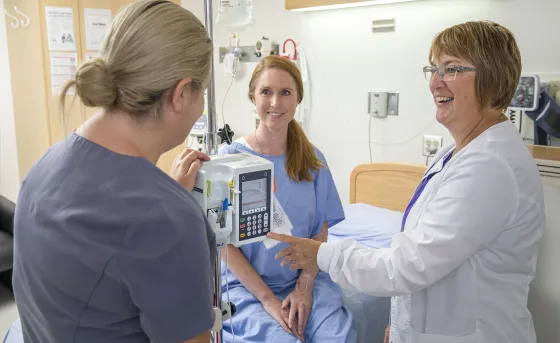 Nursing student collaborating with instructor