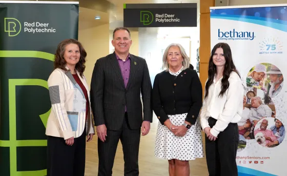 Dr. Tonya Wolfe, Stuart Cullum, Jennifer McCue, and Brooke Schwartz at the MOU resigning