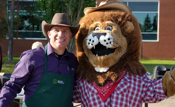 Stuart Cullum, RDP President, and Rufus, RDP mascot, at RDP's Westerner Days Pancake Breakfast on July 18, 2025