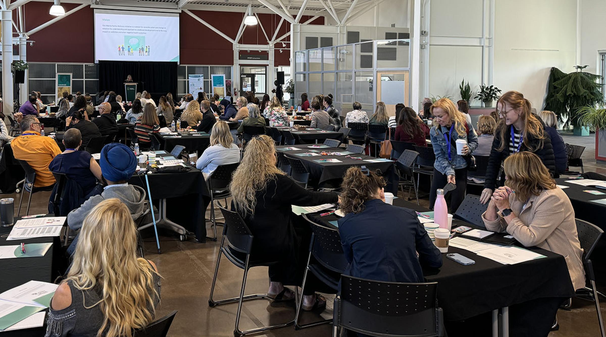 Attendees listening to speakers at Resilience Reboot Workshop