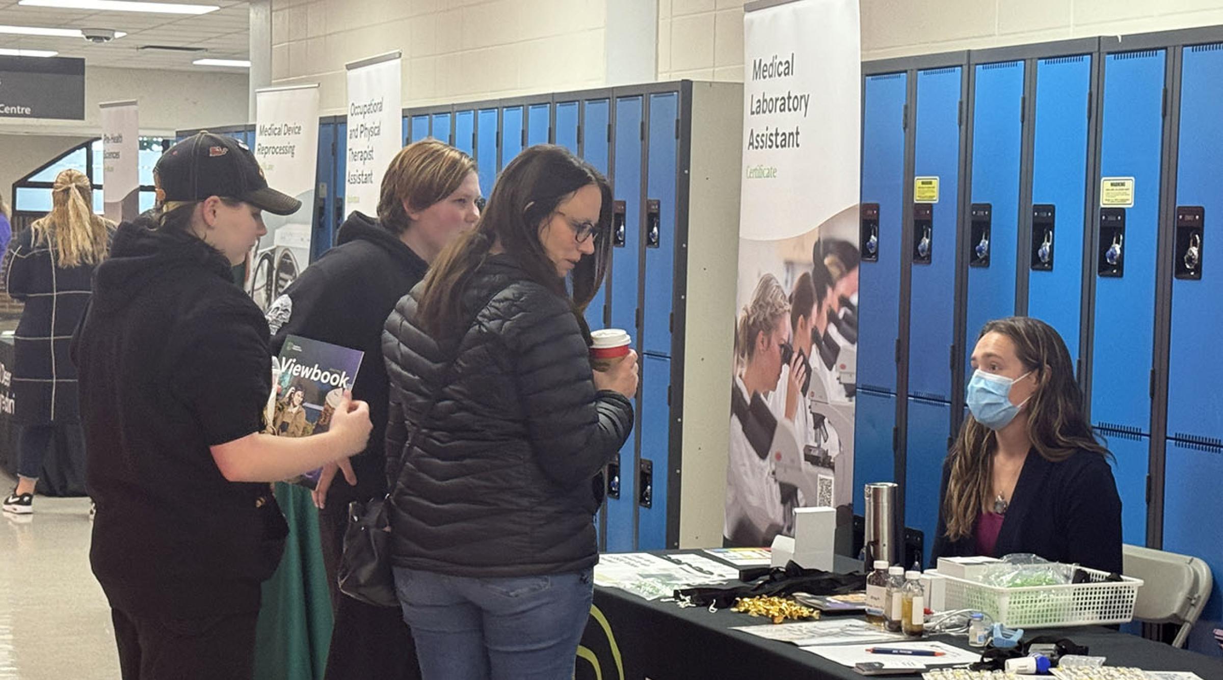 Future students meet faculty and staff at RDP's Open House program booths