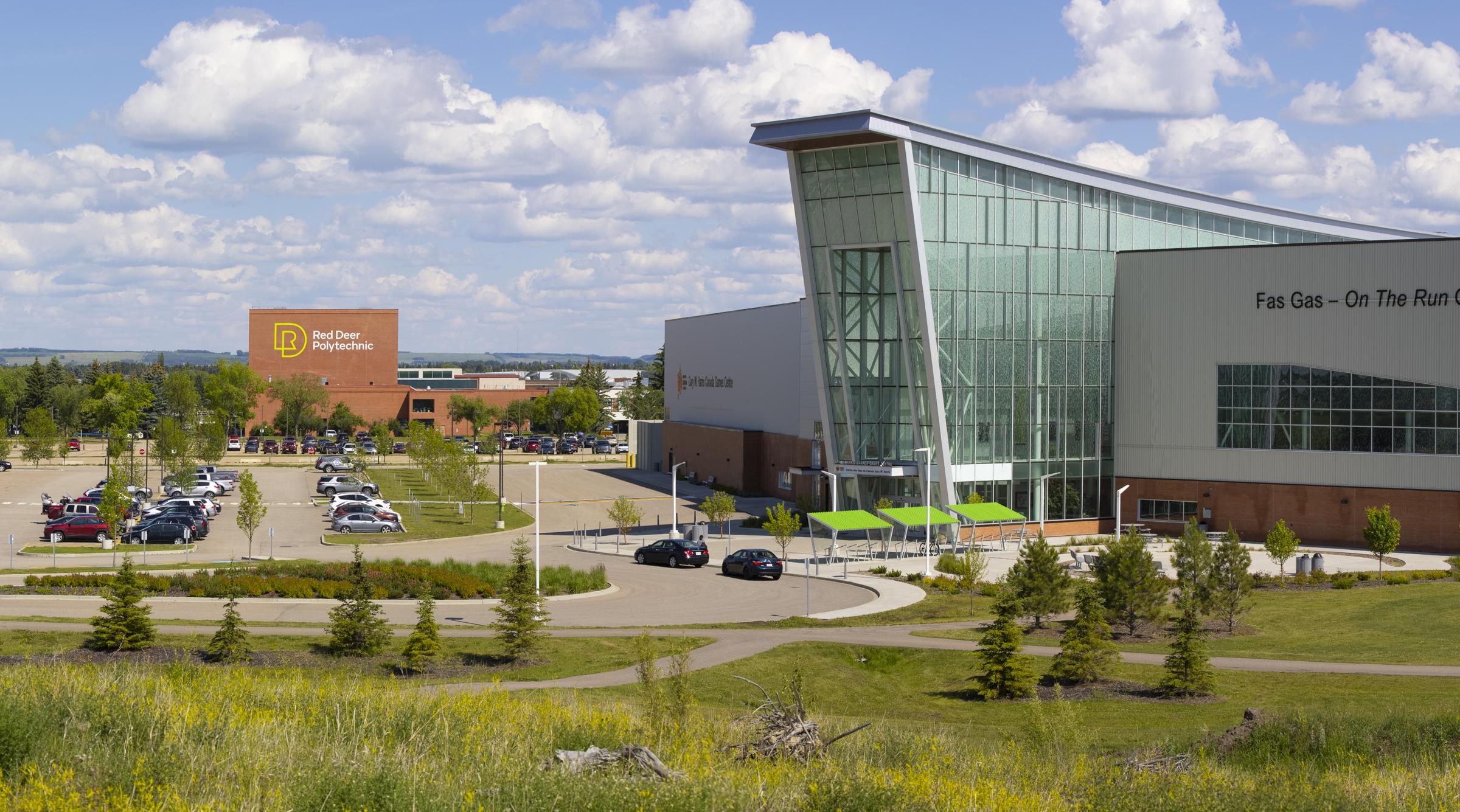 A panoramic shot of the exterior of the Gary W. Harris Winter Games Centre and the Arts Centre