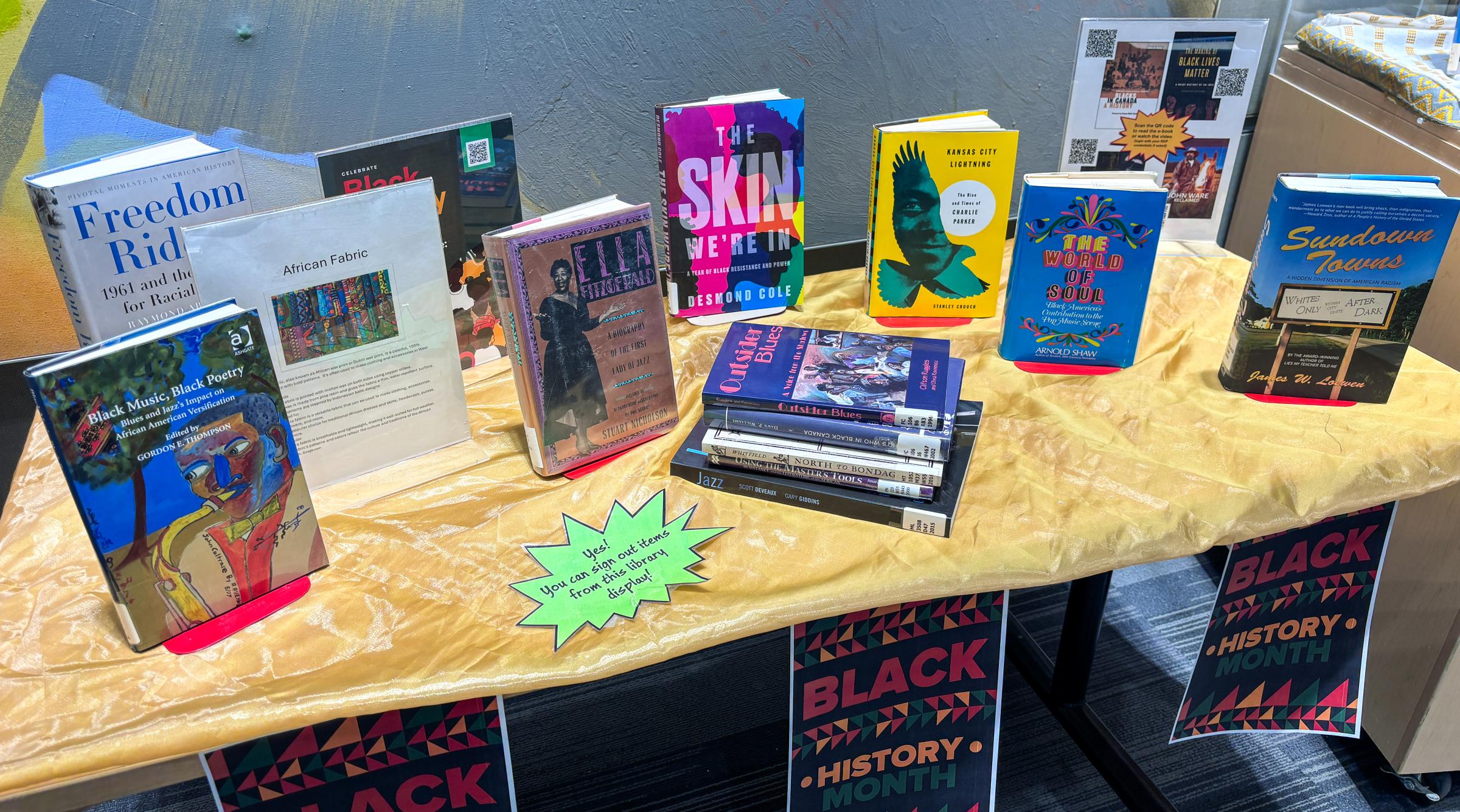 A table with books about the history & culture of Black Canadians.