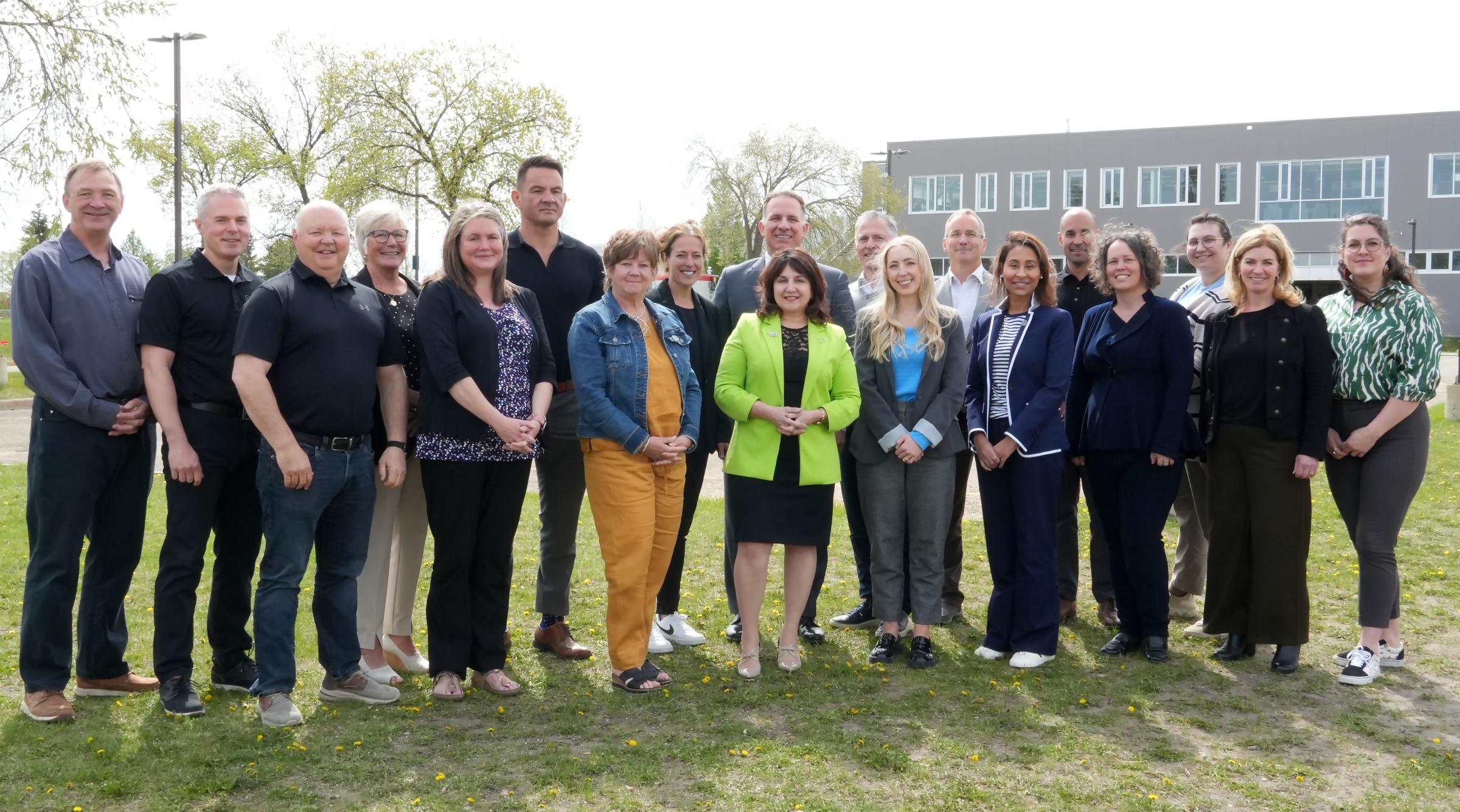 A group shot of the Board of Governors outside at the CIM-TAC expansion ground breaking ceremony