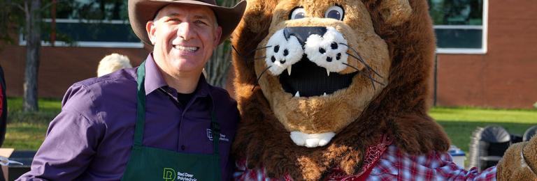 Stuart Cullum, RDP President, and Rufus, RDP mascot, at RDP's Westerner Days Pancake Breakfast on July 18, 2025