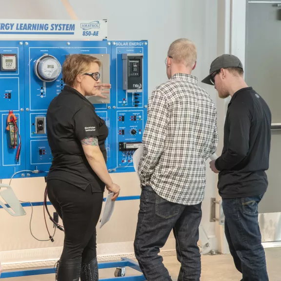 Instructors and students use equipment in Alternative Energy Lab