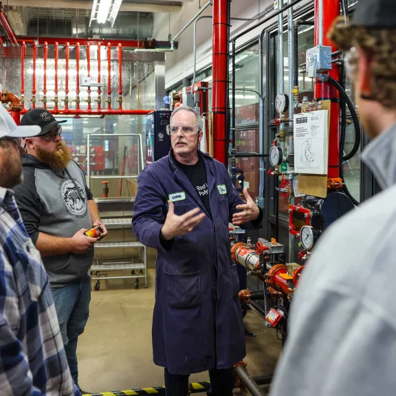 Sprinkler Systems instructor teaching students in lab