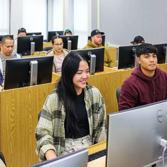 Bachelor of Commerce students on computer