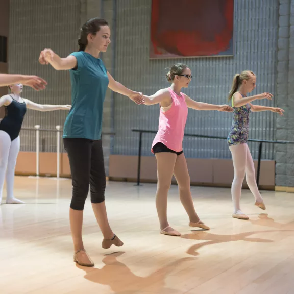 Ballet dances practicing in dance studio